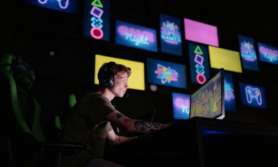a man playing a video game in a computer