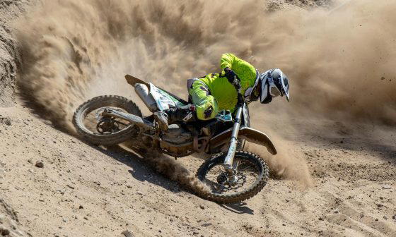 man riding motocross dirt bike