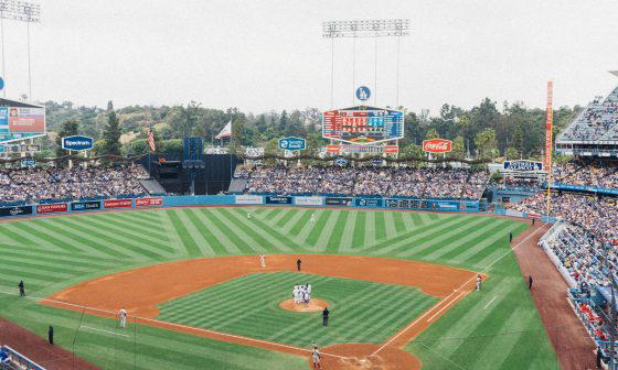 men playing baseball in stadium