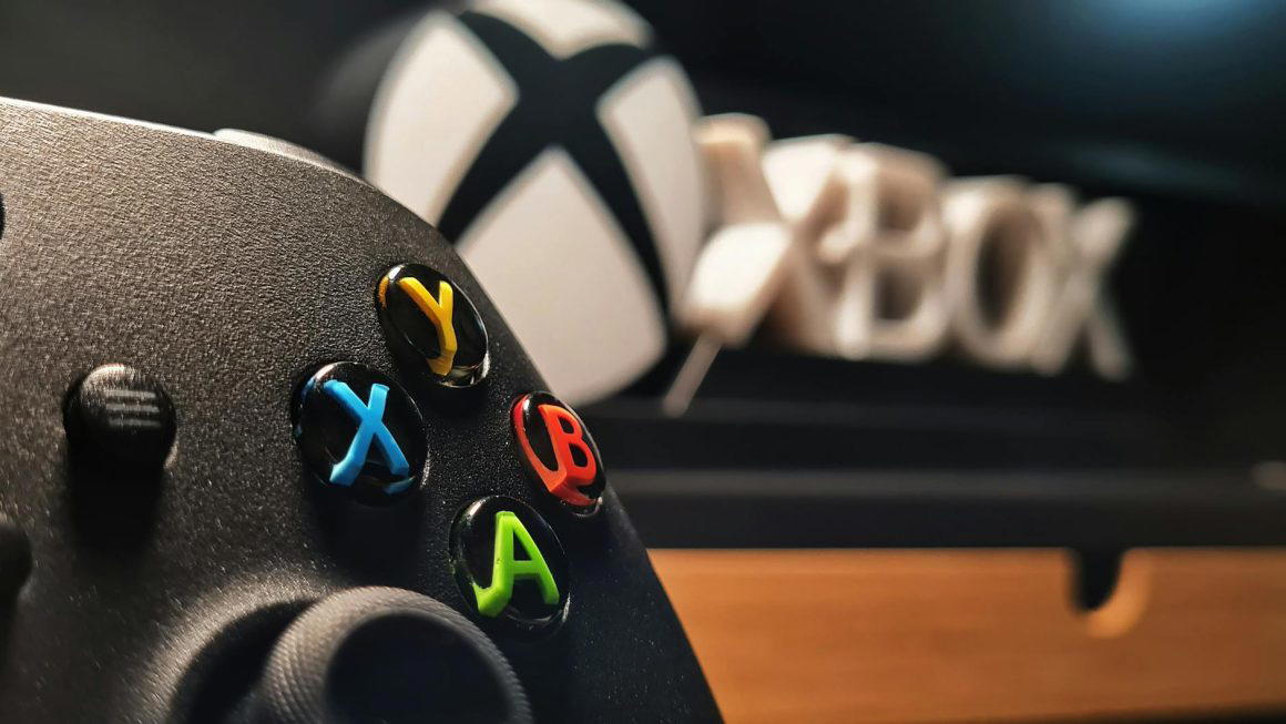 close up of xbox controller in gaming setup