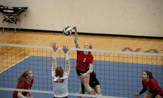 women playing volleyball game