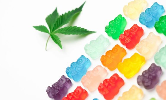 photo assorted colored gummy bears on white background